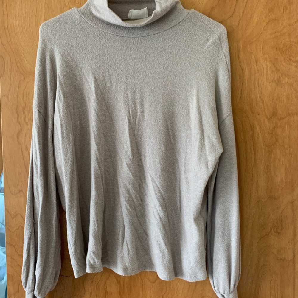 VICI turtleneck sweater.